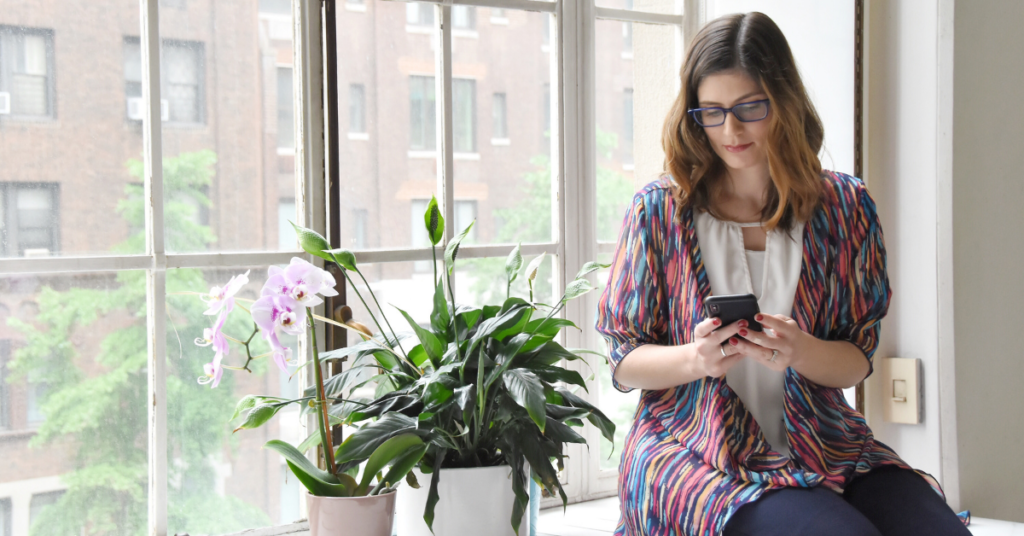 Professional woman checking her cellphone