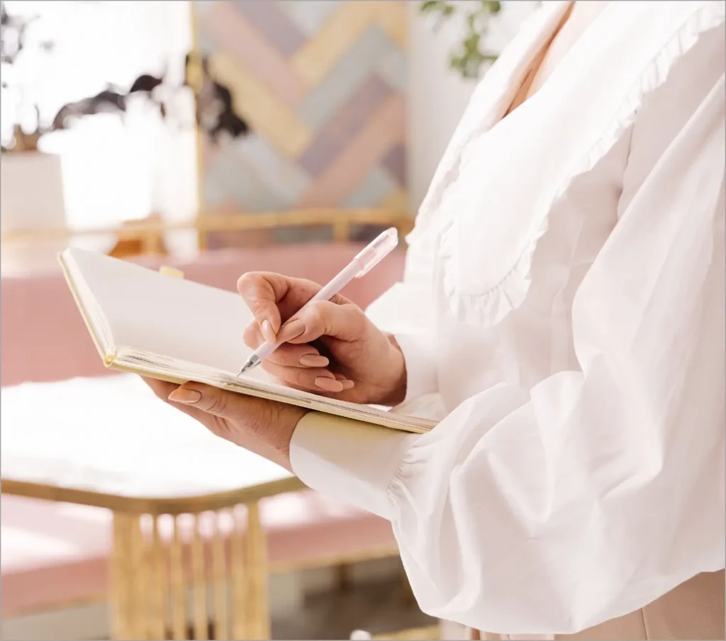 Financial advisor writing business growth notes