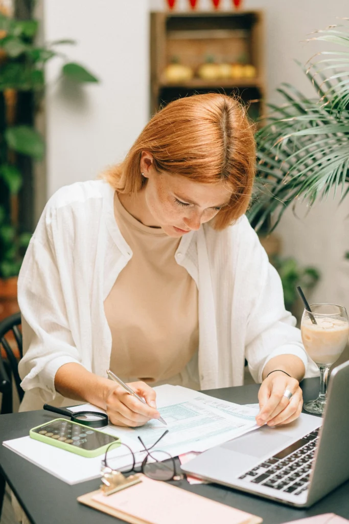 Female financial planner working at her desk