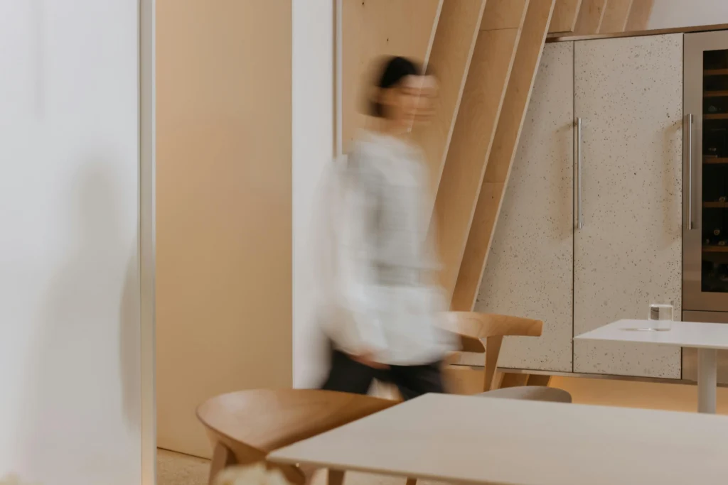 Woman walking through a modern office